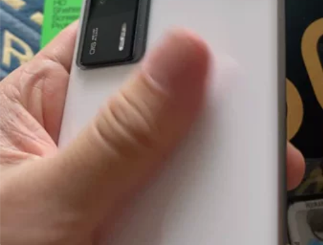 出台98新的红米K60E 机子购于京东，今...