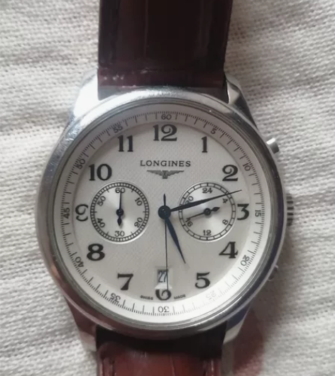 手表一块，轻微使用痕迹，计时秒表加日历 感...