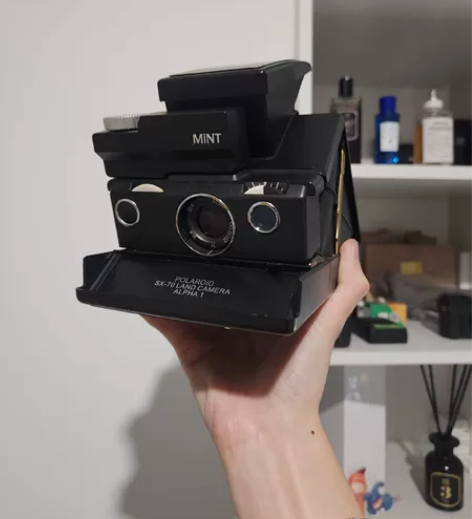 出一台Polaroid宝丽来670黑机 带...
