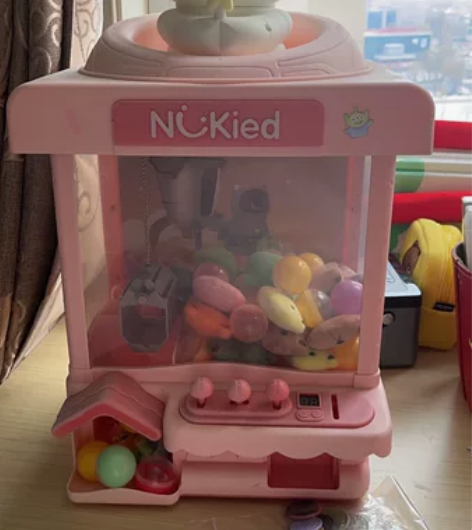 纽奇抓娃娃机 纽奇抓娃娃机，功能完好，钱币...
