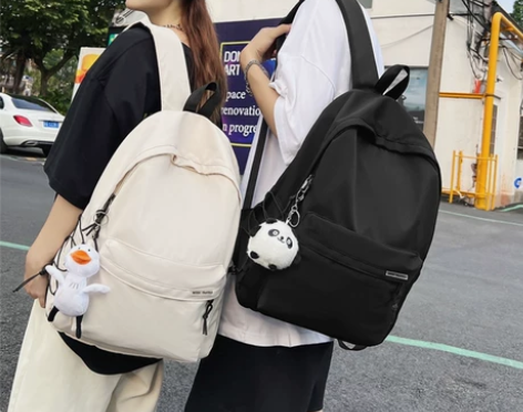 ?双肩包男士日系简约旅行包电脑背包女休闲高...