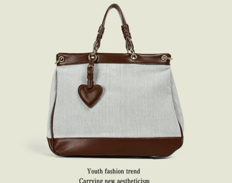 优尚女包2022春夏新品爱心牛仔帆布棋盘格...