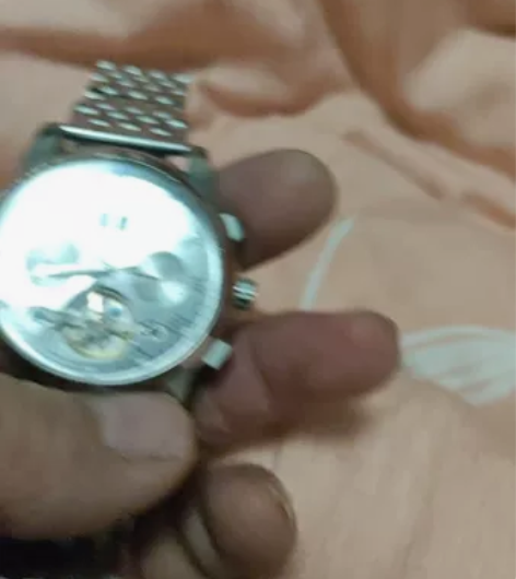 全自动双历机械手表，配钢带皮带，二手使用中...