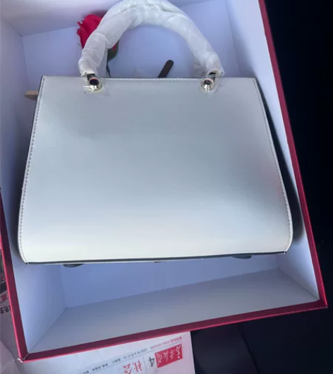 cnoles 蔻一手提包，全新未使用，旗舰...