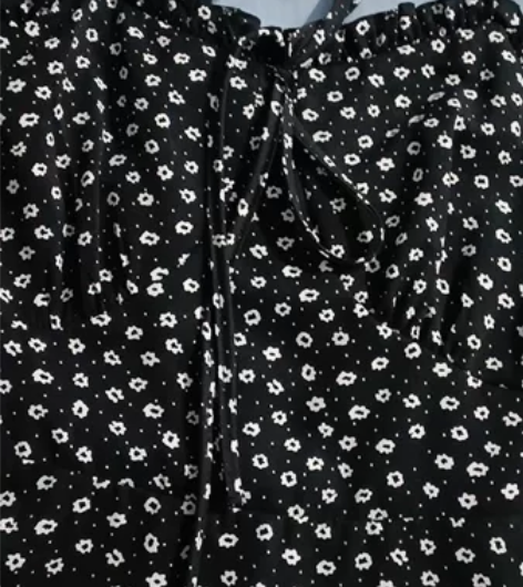 ?茶歇法式黑色吊带碎花连衣裙子女夏季202...