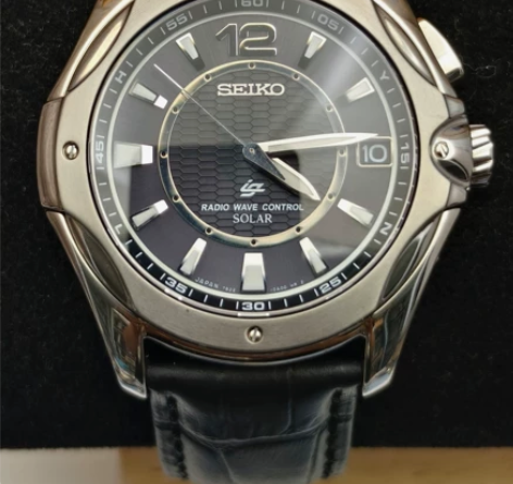 精工钛合金7B22光动能电波男表 该表是个...