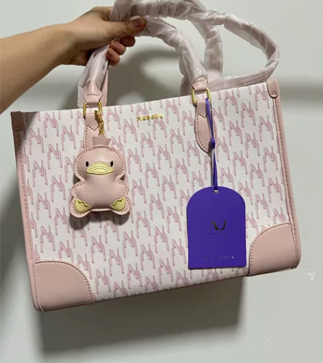 出全新带吊牌！纽芝兰公文包桃桃粉中号！ 可...