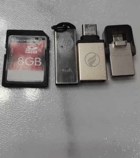 SD卡8g原来佳能相机里用的，惠普U盘标注...