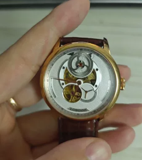 罗宾尼机械手表，细微使用痕迹，无明显磕碰划...