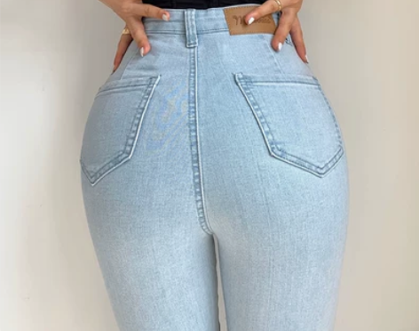 ?欧美性感双口袋紧身包臀小脚高腰牛仔九分长...