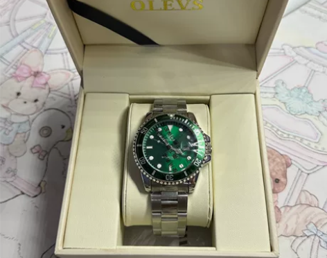 ?OLEVS欧利时手表 附带全国联保卡一张