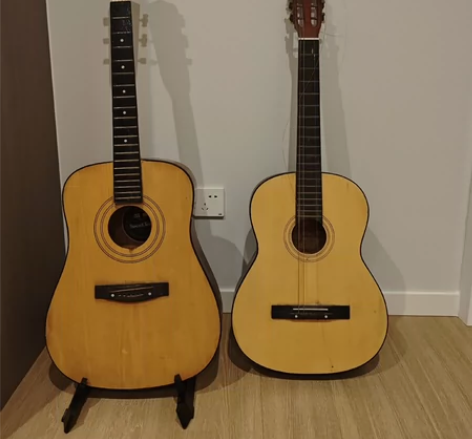 两把90 2把吉他 完好无损 弦都要重新换...