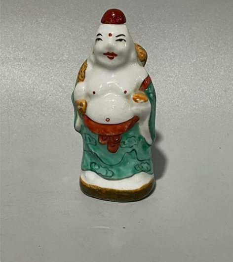 回血瓷手绘珐琅彩布袋佛鼻烟壶，画工精细，品...