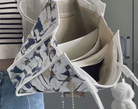 小众设计感！泼墨2024新款高级单肩手提斜...