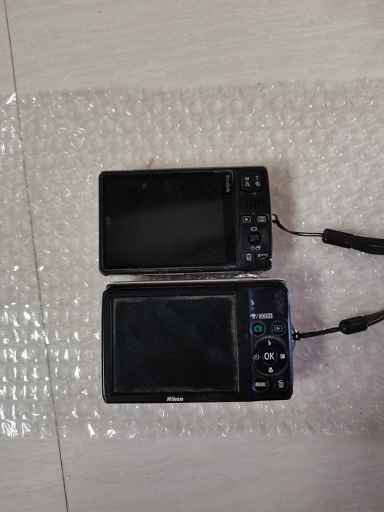 尼康数码相机 柯达   都不开机，不知道什...