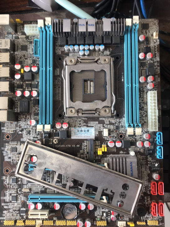 拆机一片华南金牌主板X79 和CPU E5...