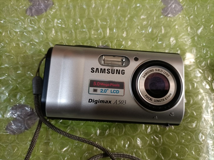 三星数码相机 A503，功能正常 品相如图...