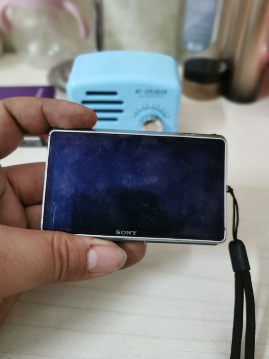 索尼数码相机，TX100，可正常使用，边框...