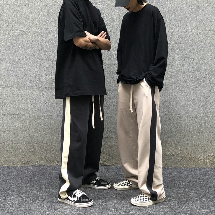 ins高街复古侧边条纹直筒休闲运动卫裤美式...