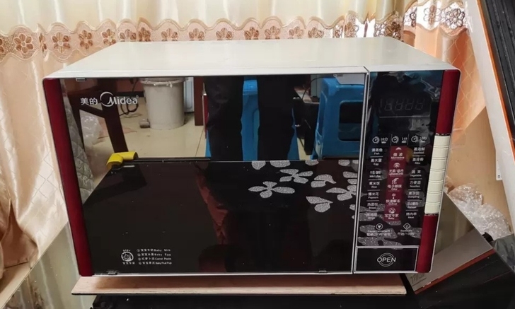 美的微波炉家用多功能二手蒸烤箱一体机不锈钢...