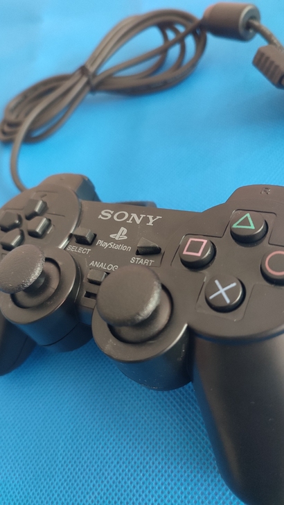 索尼游戏原装手柄，质量好，功能正常。