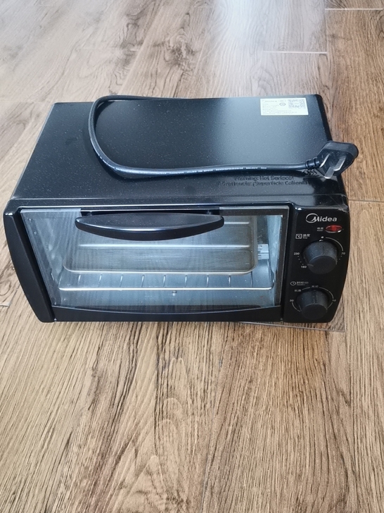 美的电烤箱t1-108b，一时性起买的，用...