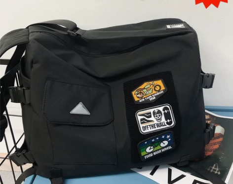 【清仓】大容量日系潮牌嘻哈斜挎包男士工装斜...