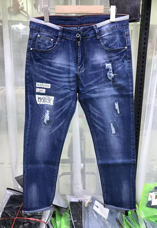 男士扎腰带假破洞牛仔裤蓝修身版有点褪色
