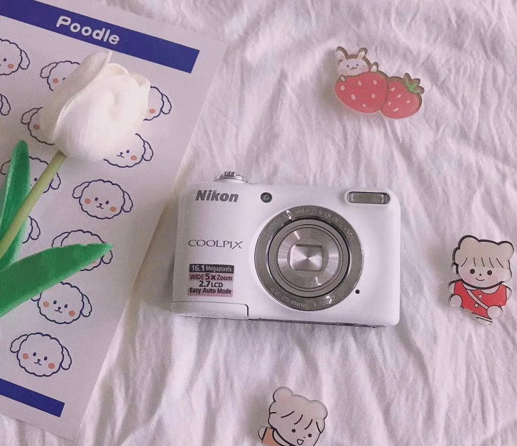 尼康 奶白色相机 ccd 数码相机