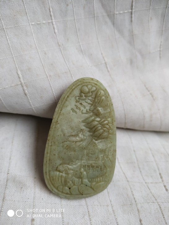 和田玉雕刻的山水画