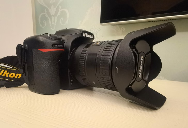 尼康D7500，配18-200镜头。18年...