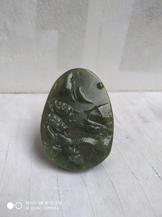 和田玉雕刻的山水画