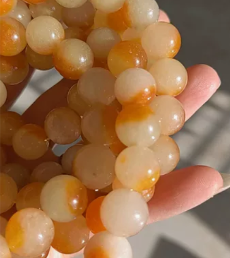 天然的金丝玉地表料红脸蛋儿，卡1.4的珠子...