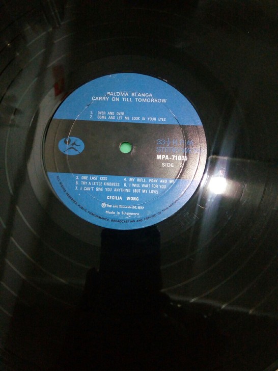 美国乡村歌曲,新加坡版本,英文歌曲,有划痕...