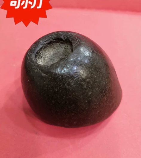 石器时代像宇宙飞船回收舱穿孔石器 距今已有...