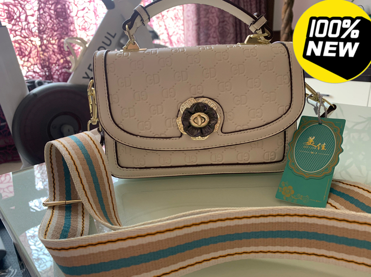 山茶花女包,全新带吊牌,包包太多 买来一直...