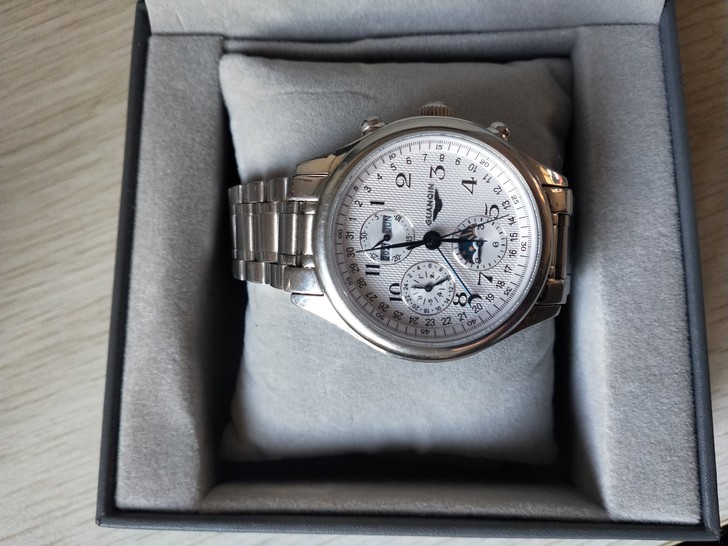 个人使用的一块冠琴腕表,八针带月相,京东自...