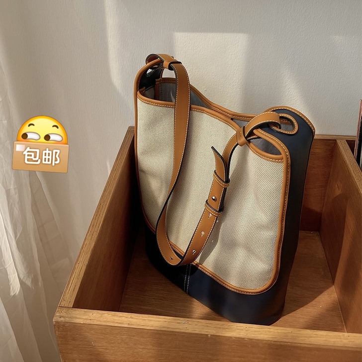 撞色帆布水桶单肩包大容量斜挎包