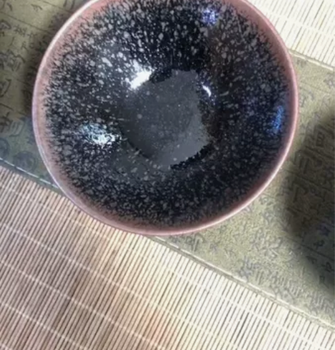 柴烧自带彩的油滴  因为温度很高烧出来的建...