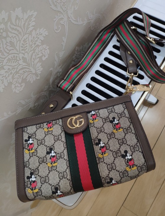 商场高品质背包女包斜挎包老花米奇卡通女包皮...