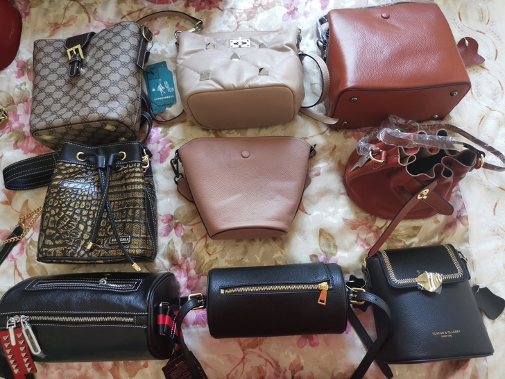 真皮包包清库存，第二张是价格