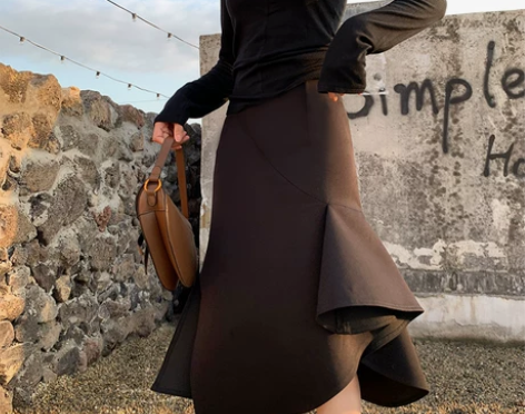 黑色不规则半身裙女包臀鱼尾裙中长款高腰显瘦...