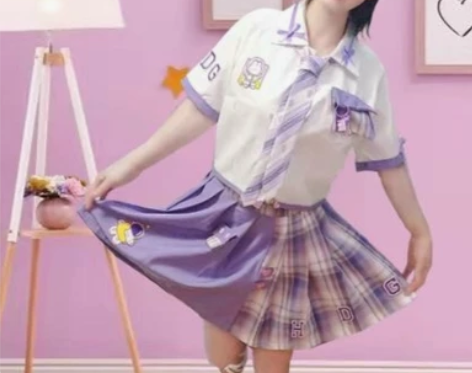 紫色甜美少女百搭刺绣爱心口袋不对称百褶裙半...