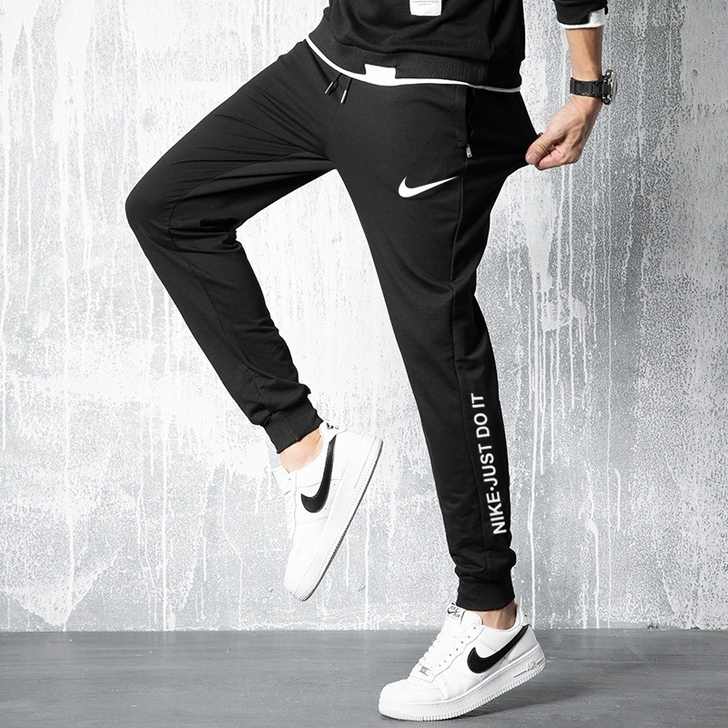 闲置nik耐尅官春秋束脚卫裤运动裤休闲裤男...