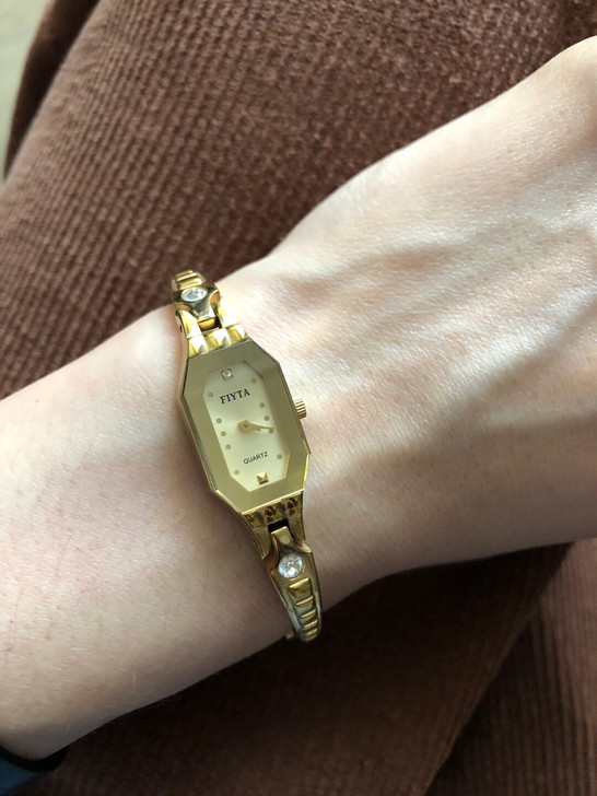 飞亚达 女表 金色镶钻
