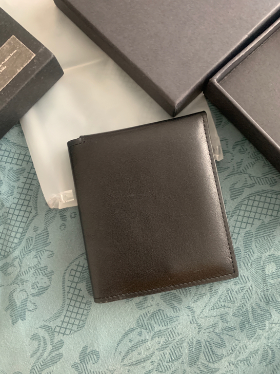 Troika男式钱包 放的时间长了外盒有点...