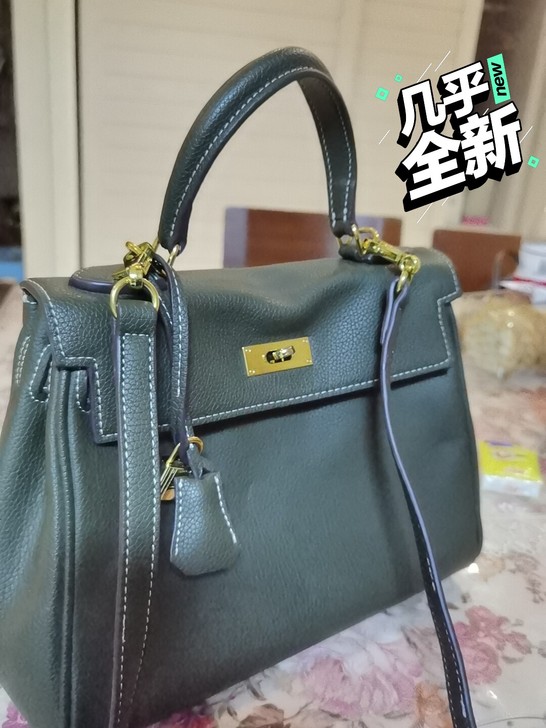 新款易菲女包，几乎全新，橄榄绿色，休闲款式，