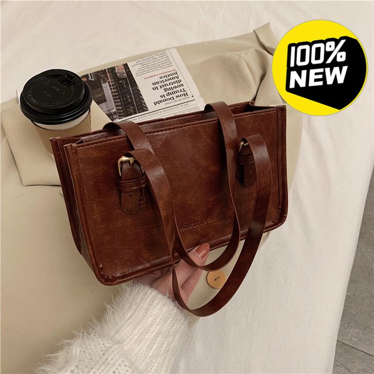 全新包包棕色