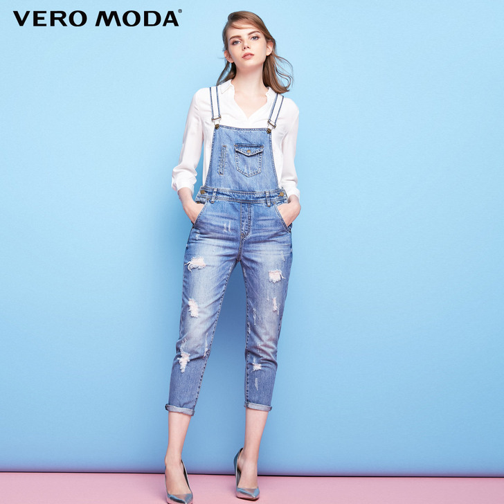 VeroModa破洞系扣门襟高腰九分背带牛...