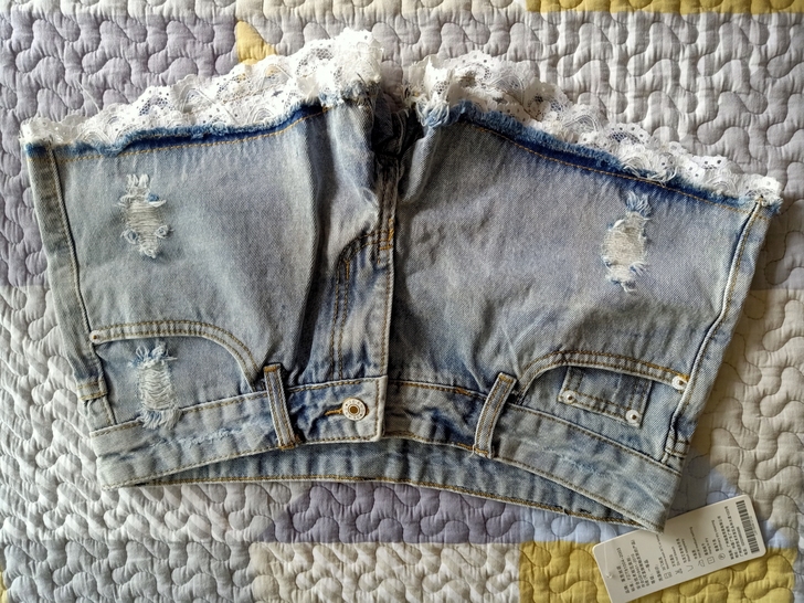 破洞牛仔短裤女夏新款时尚蕾丝边阔腿热裤，全...